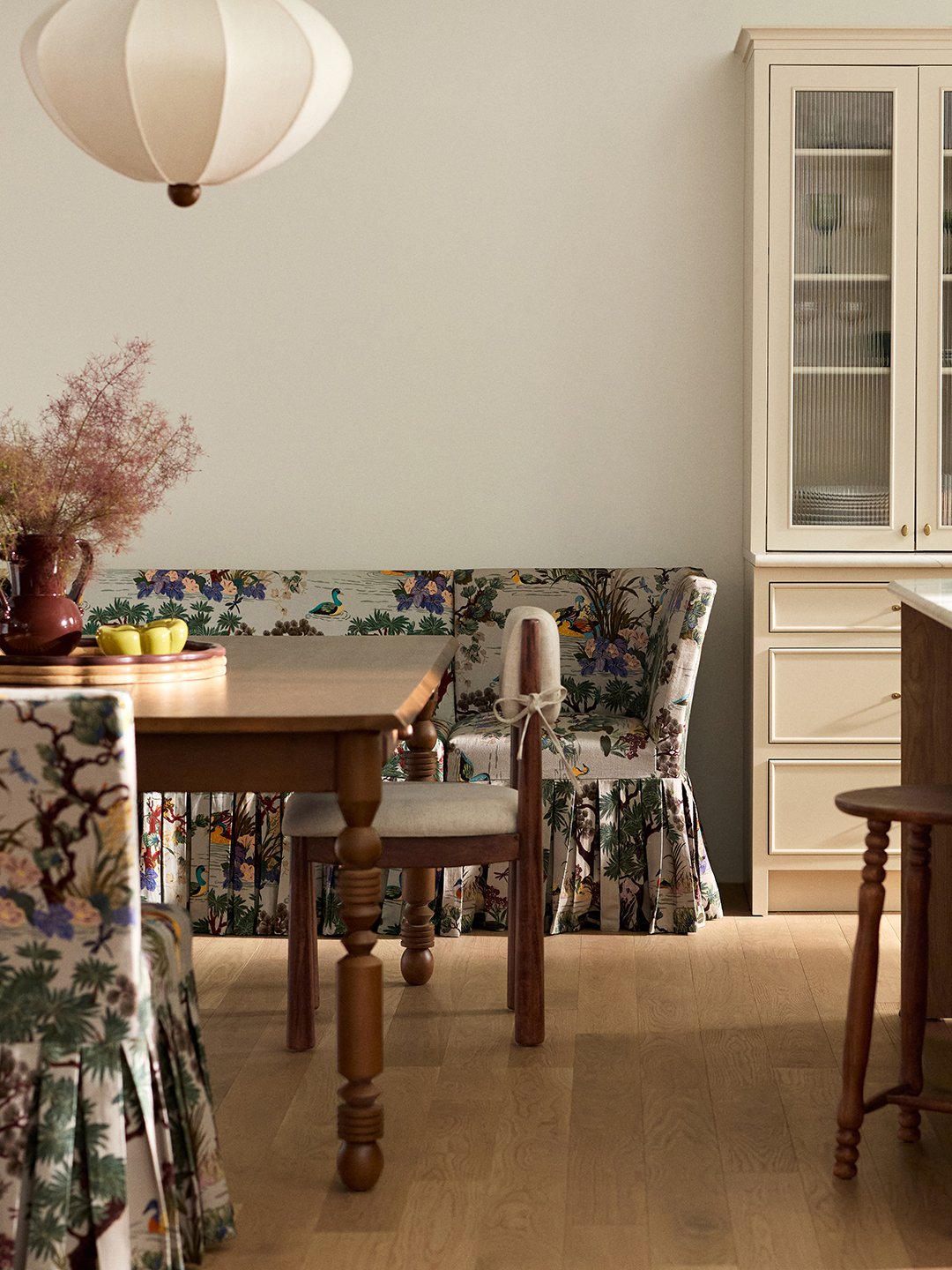 upholstered floral banquette in kitchen