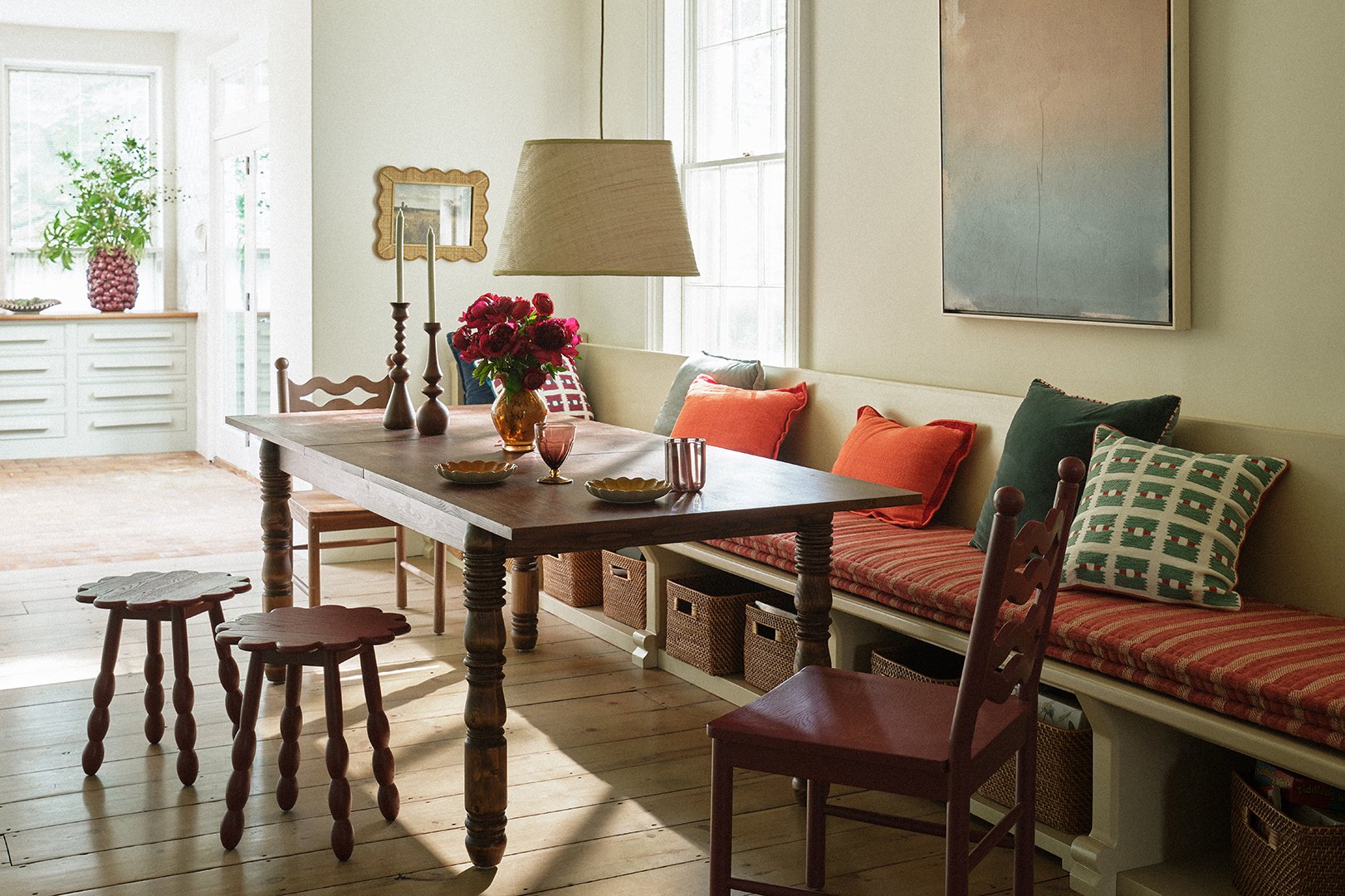 banquette dining area with flower stools