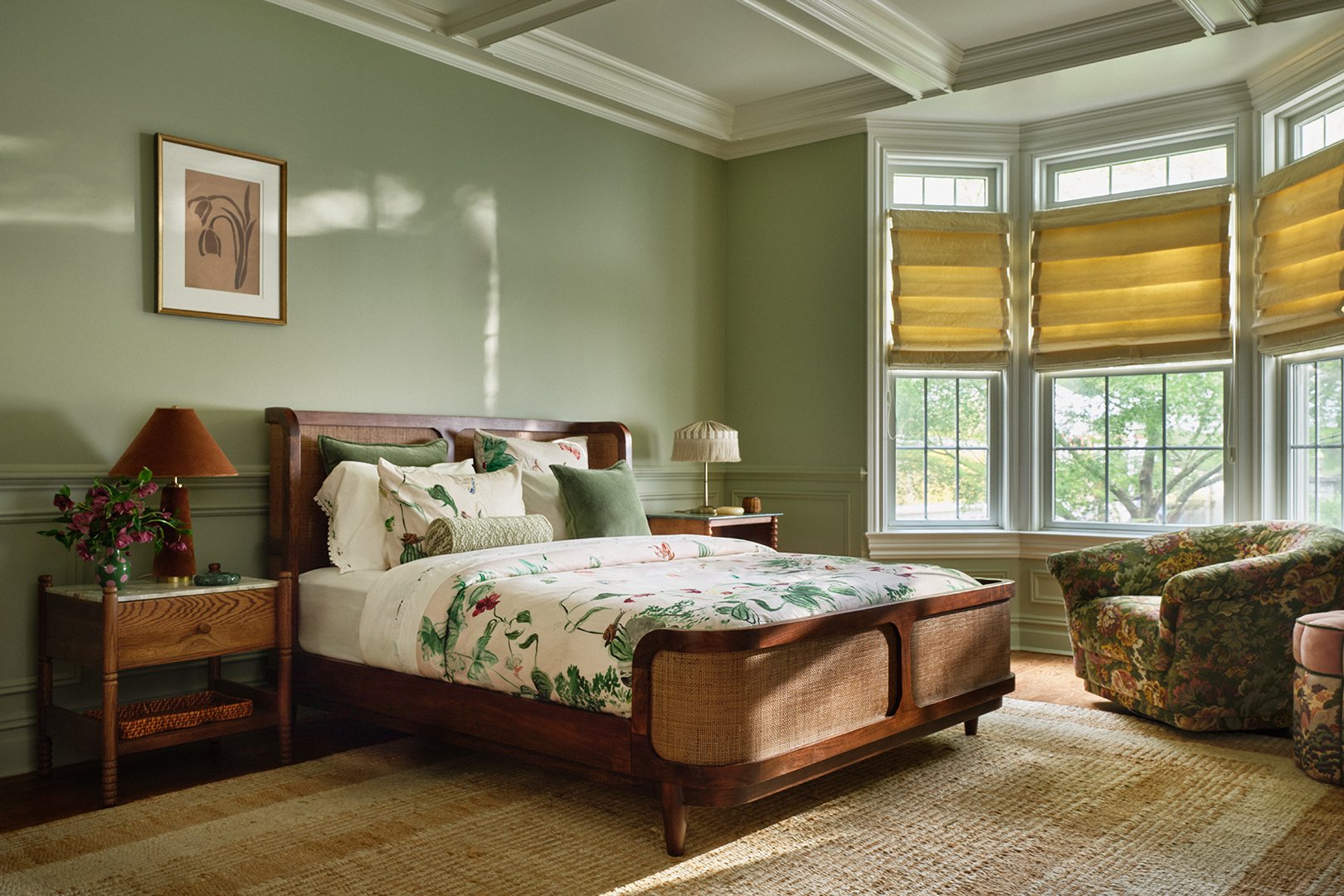 sage green bedroom with floral bed
