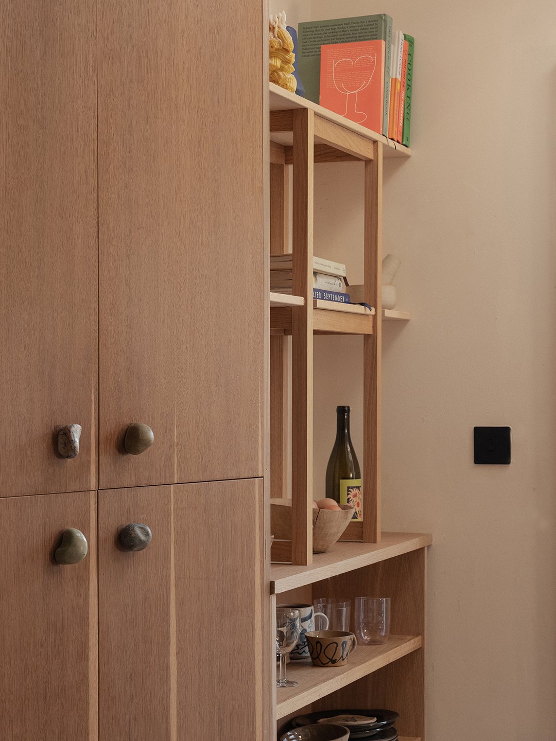 pantry cabinet with quirky handles