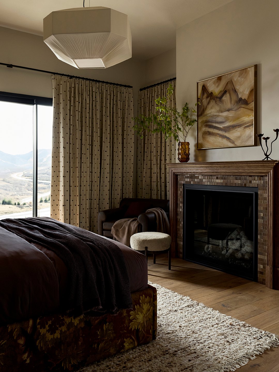 moody brown tile bedroom fireplace