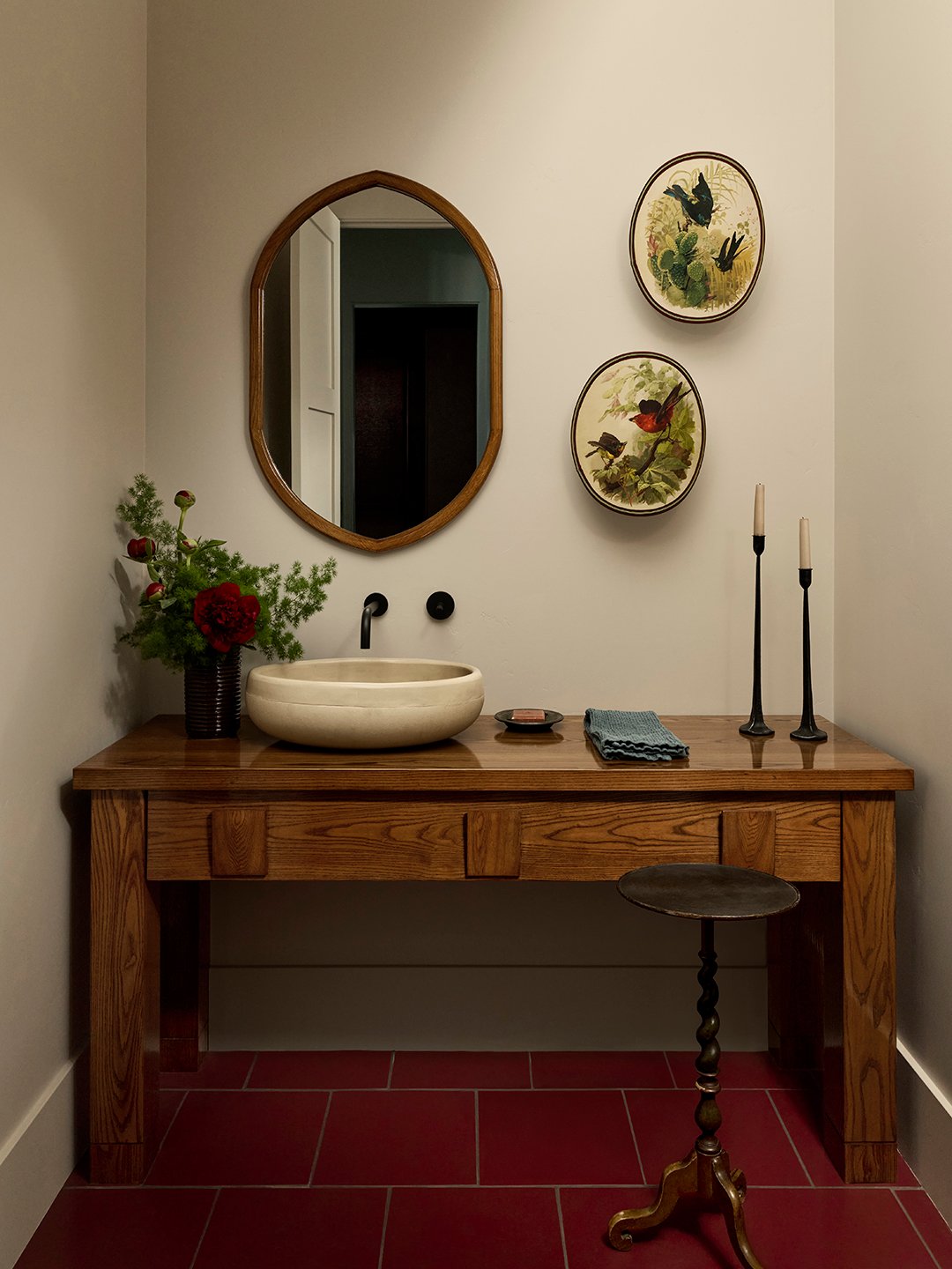 powder room with bird art