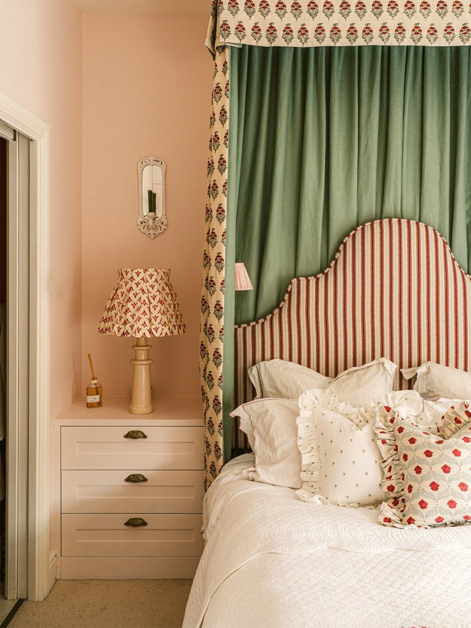 bedroom with striped headboard
