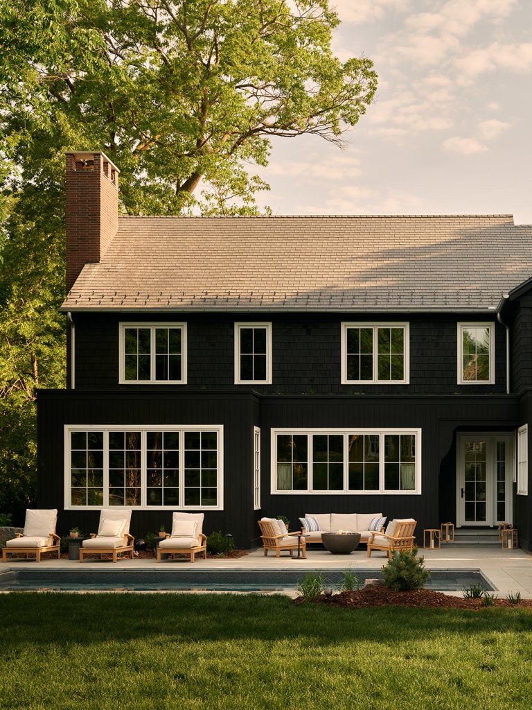 black exterior with white window trim