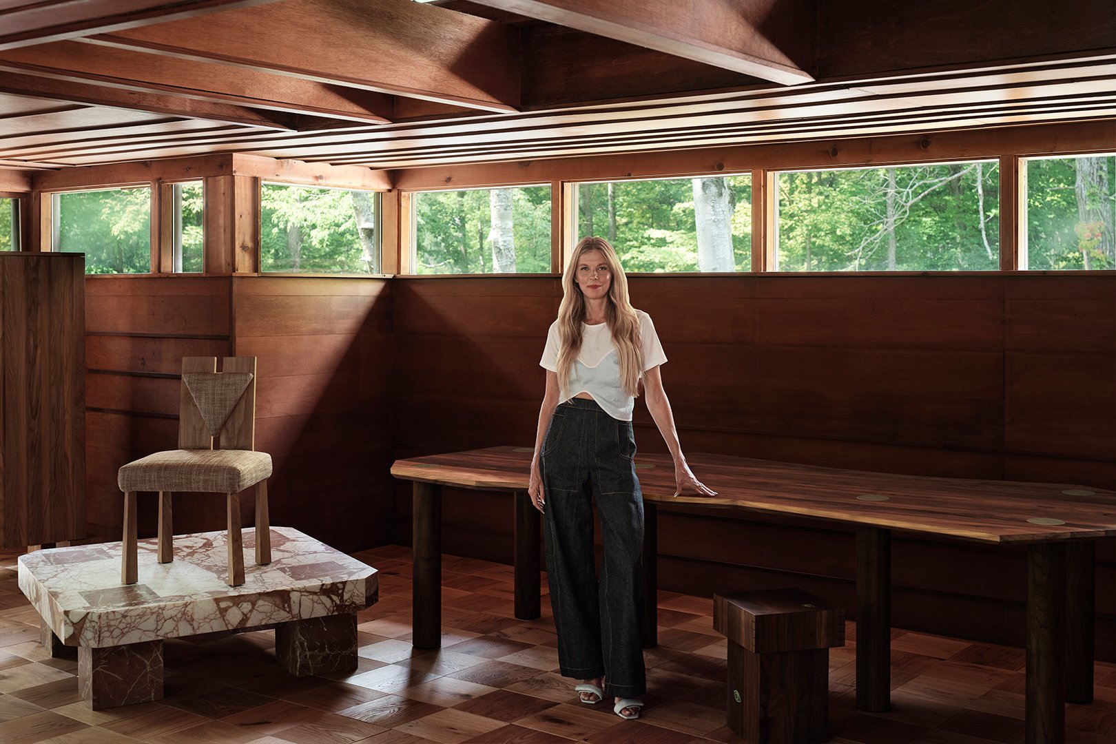 woman leaning on table