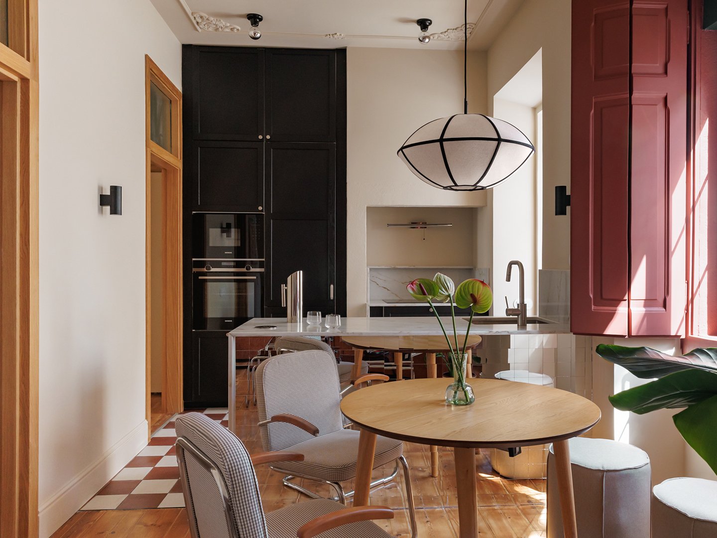 A Mirrored Island Makes This 646-Square-Foot Lisbon Apartment Feel Grand
