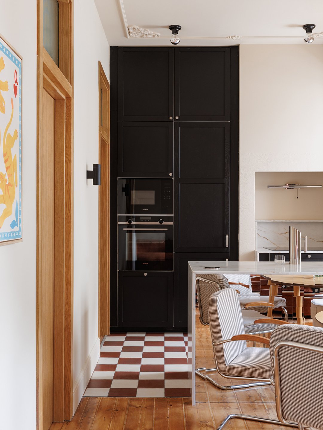 A Mirrored Island Makes This 646-Square-Foot Lisbon Apartment Feel Grand