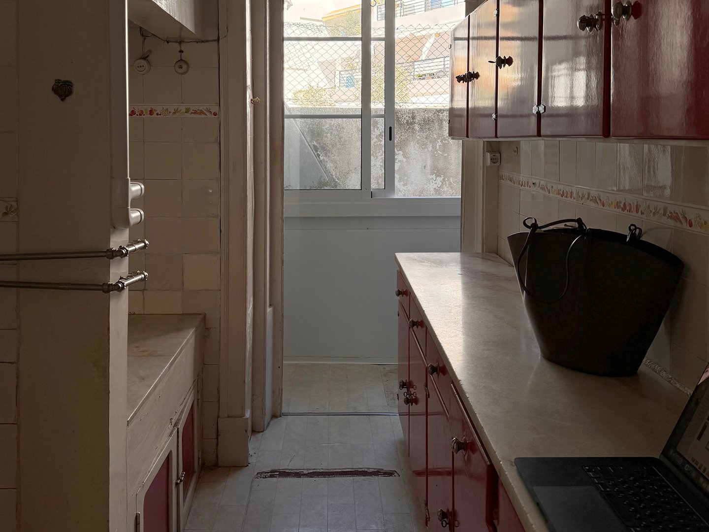 A Mirrored Island Makes This 646-Square-Foot Lisbon Apartment Feel Grand