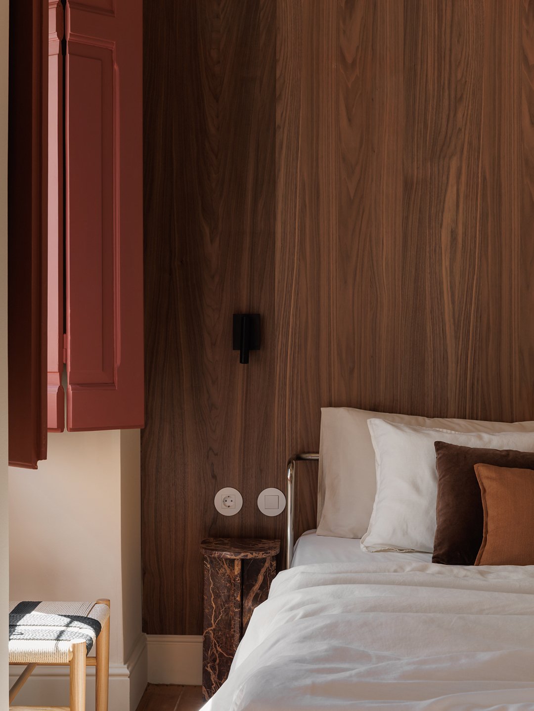 bedroom with wood wall