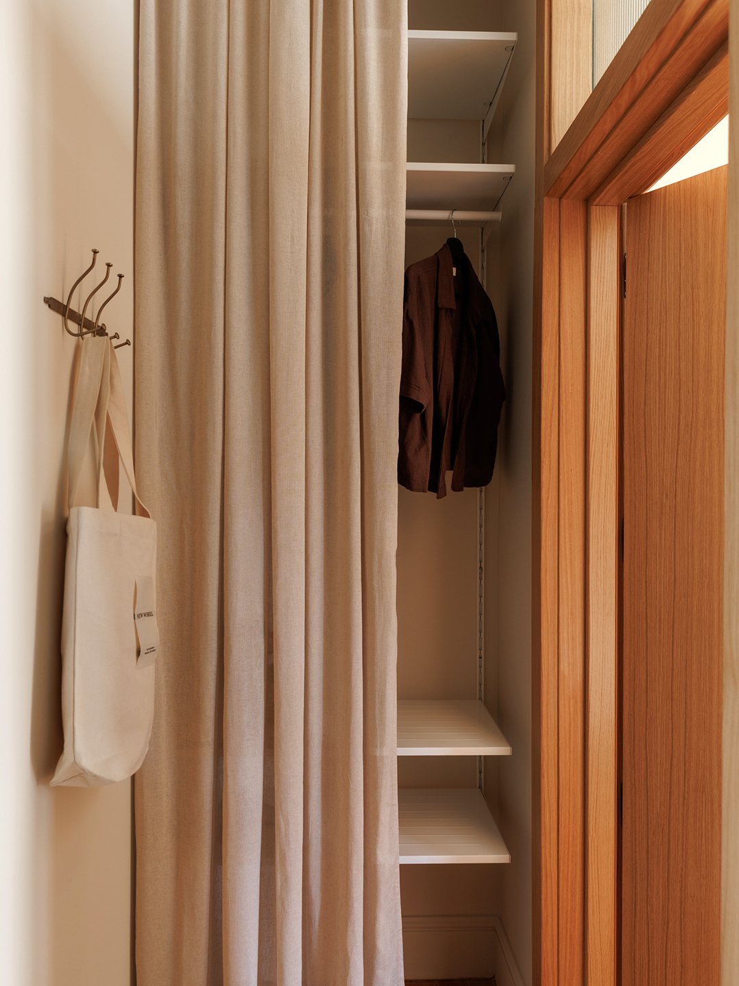 entryway with linen curtain