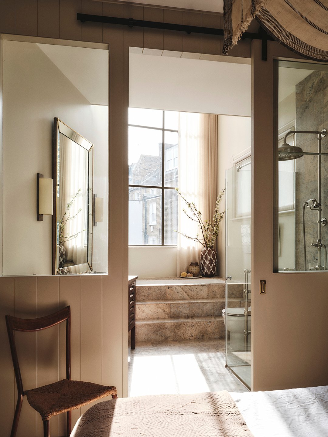 bathroom with steps into tub