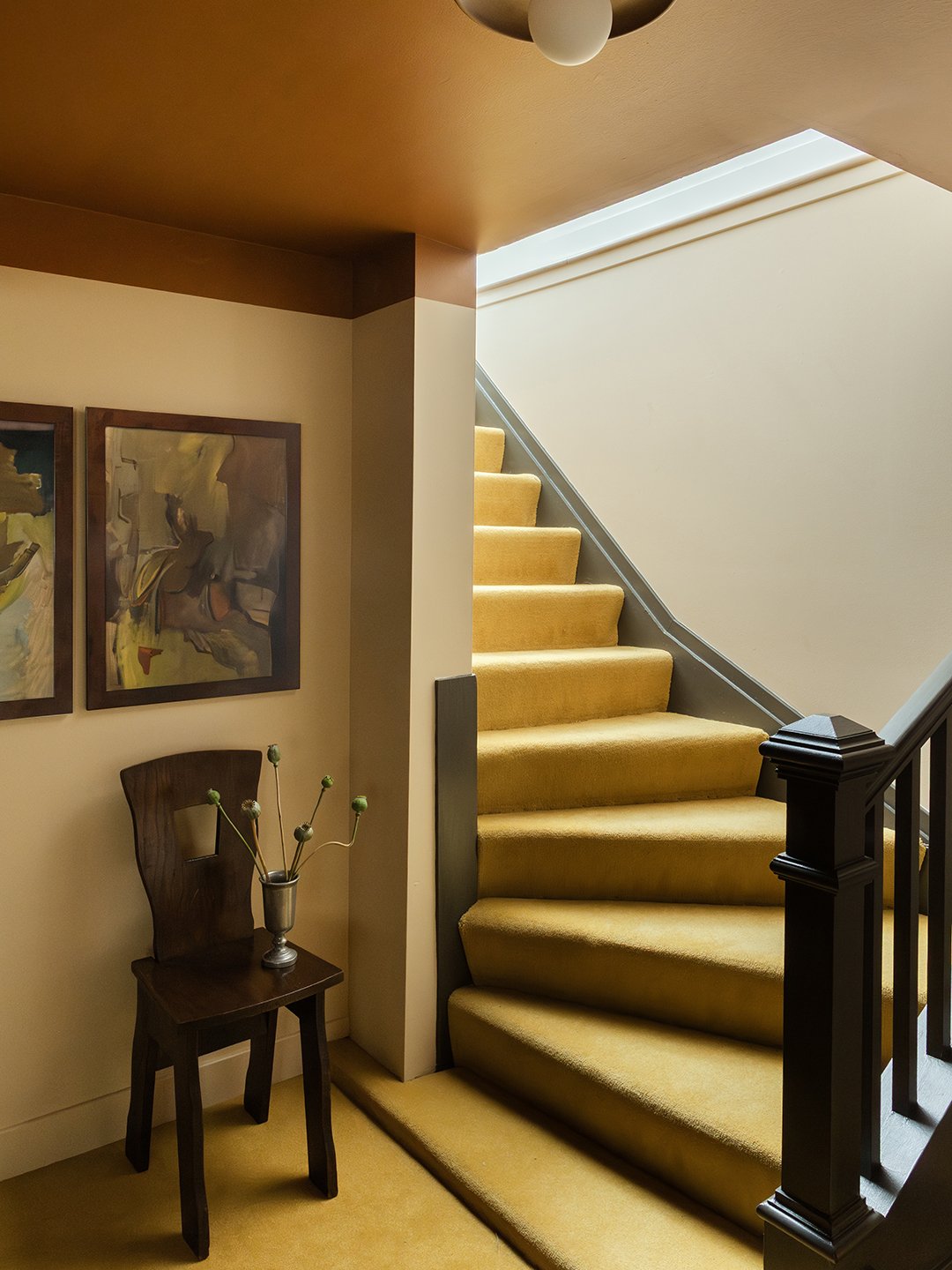yellow carpeted stairs