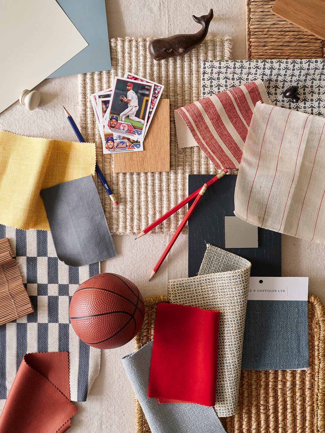 fabrics and pictures pinned to a wall