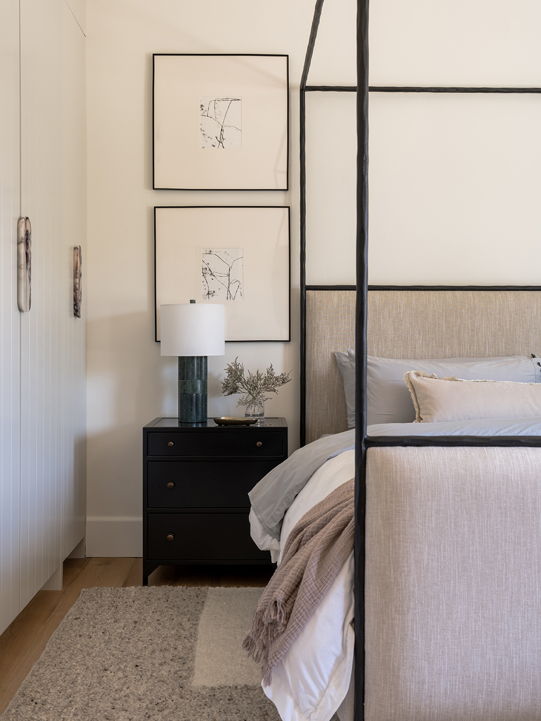 white bedroom with black accents