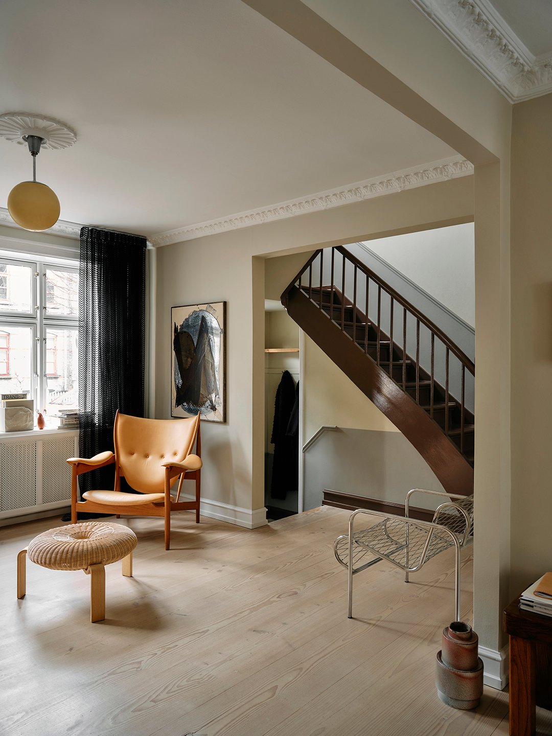 modern apartment with brown staircase