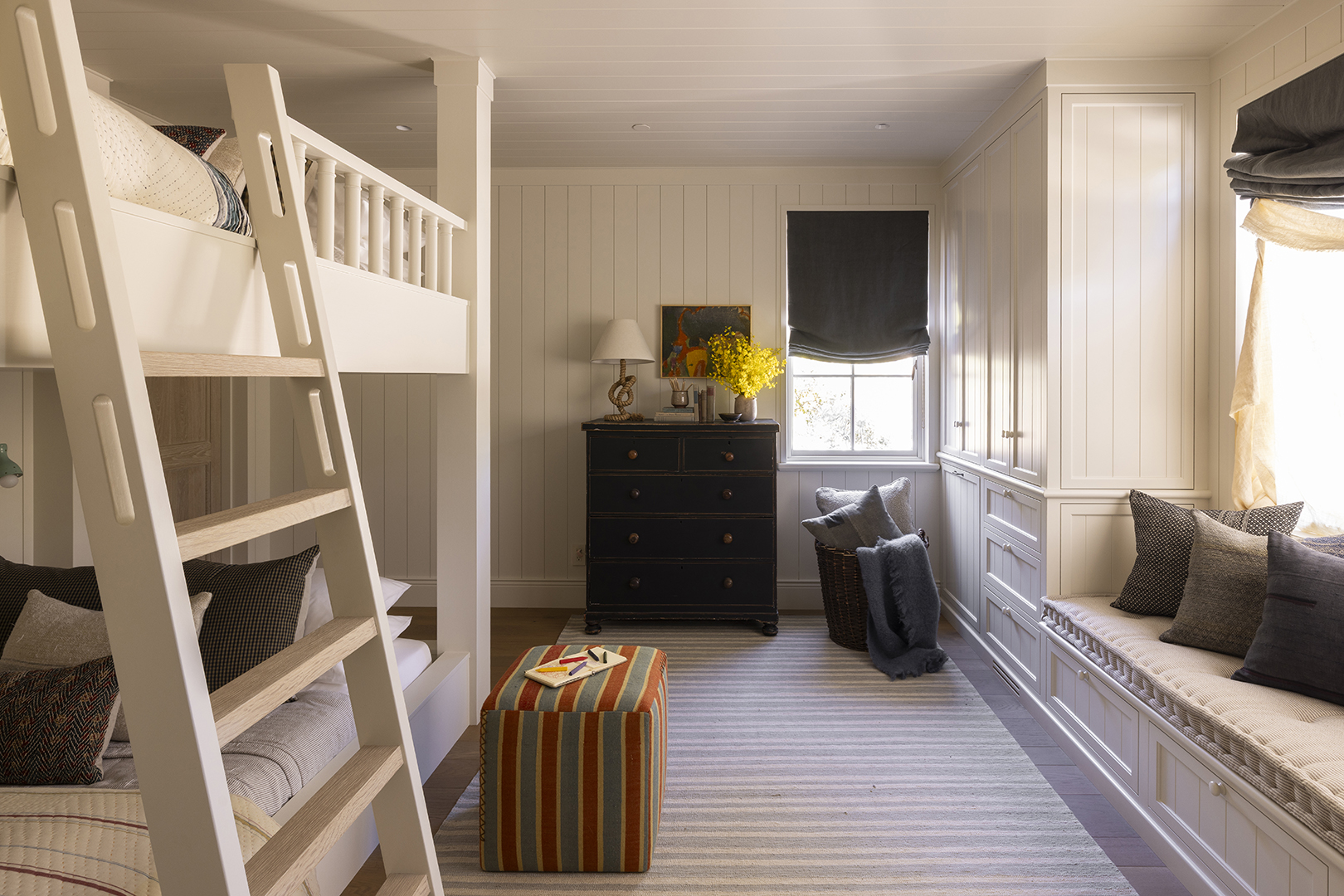 white bunk beds in a white room
