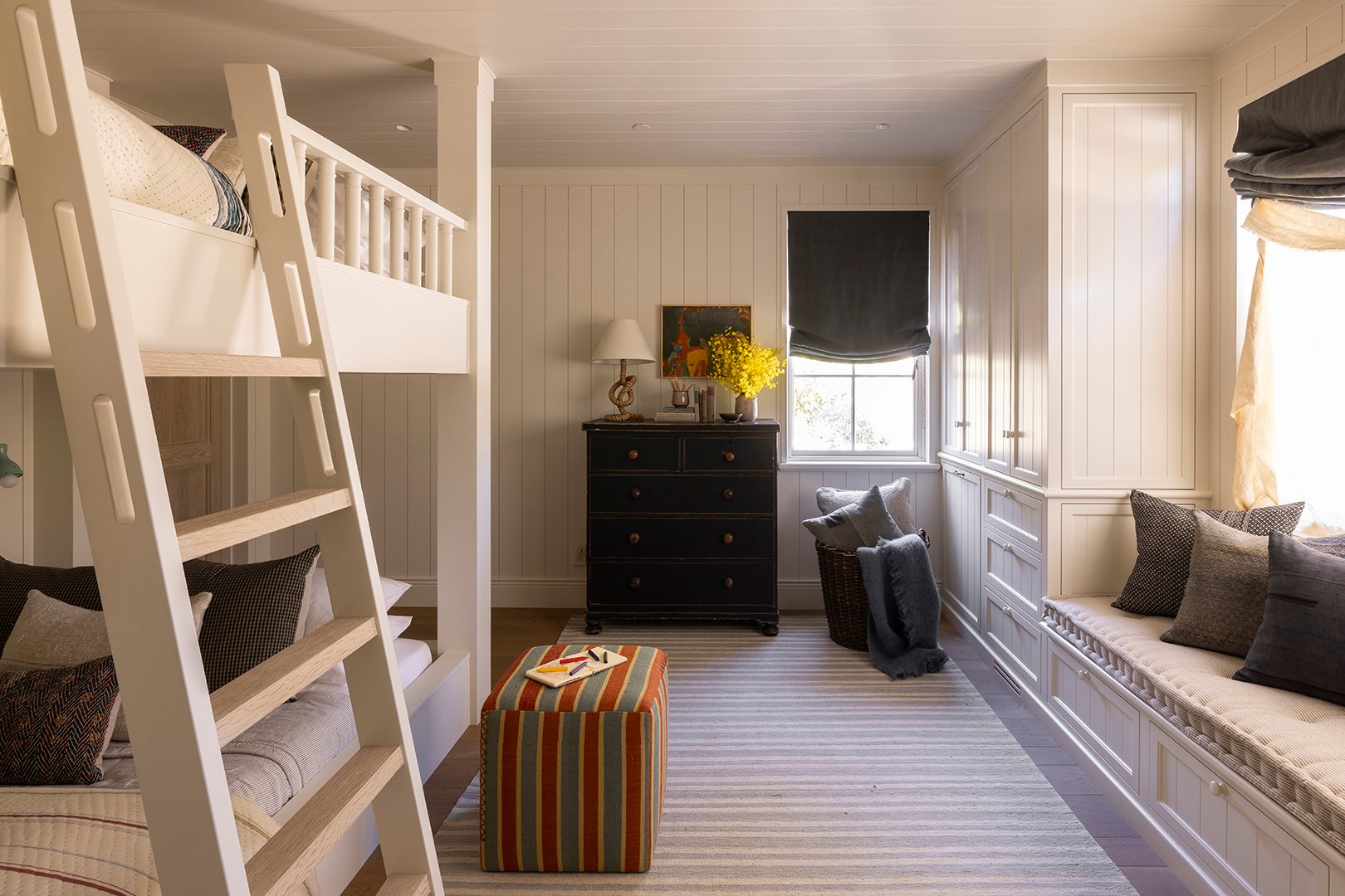 white bunk beds in a white room