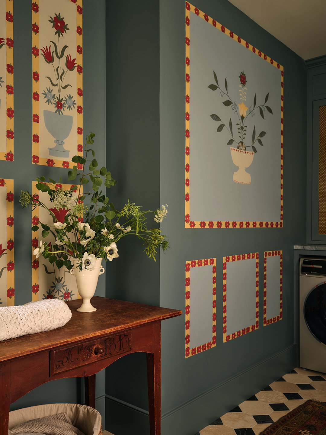 laundry room with painted wall