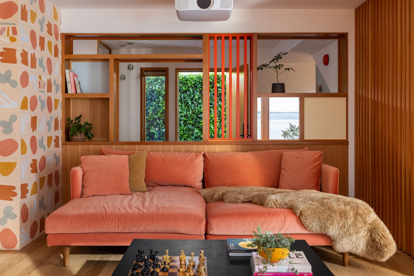living room with coral sofa