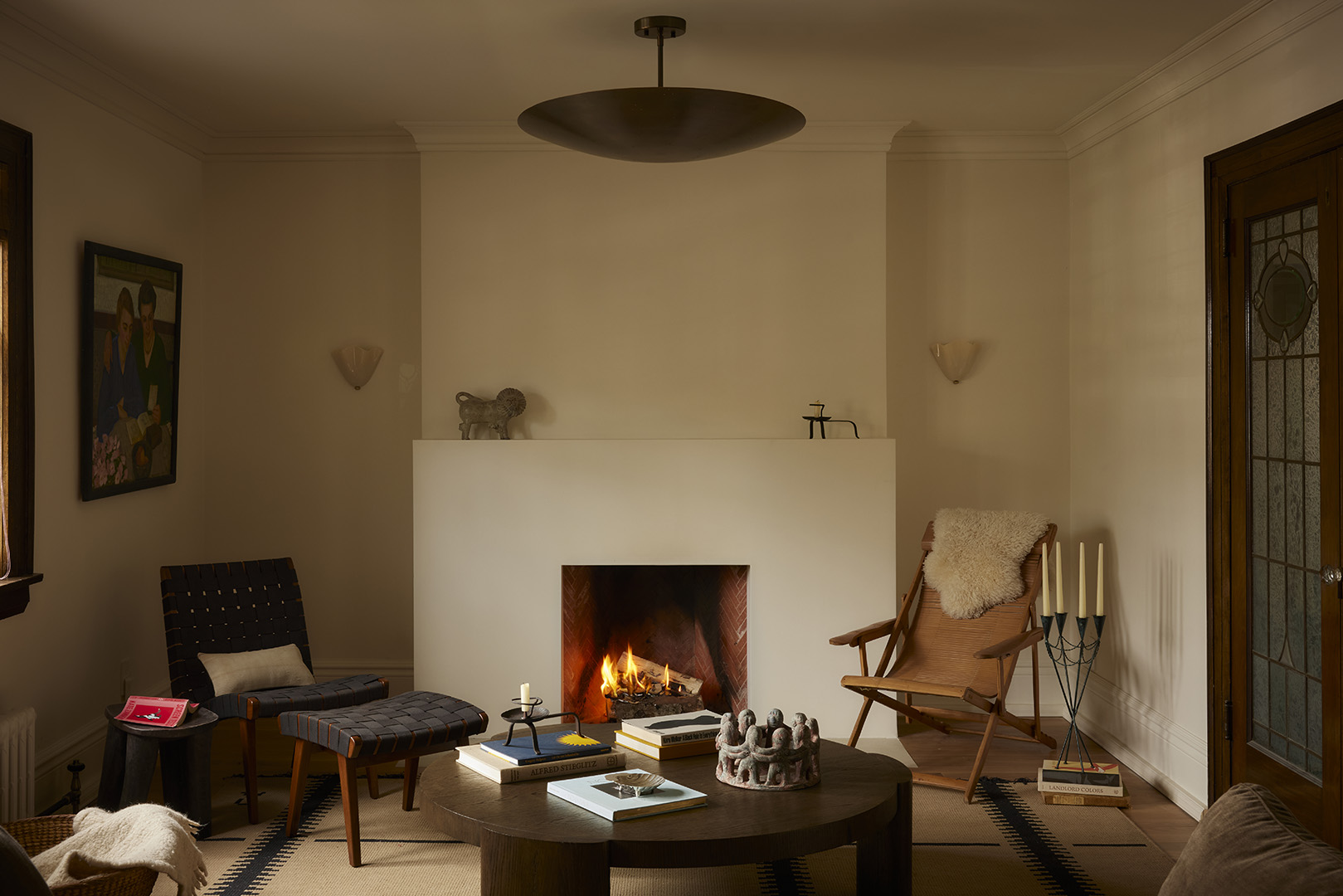 cozy living room with brass pendant