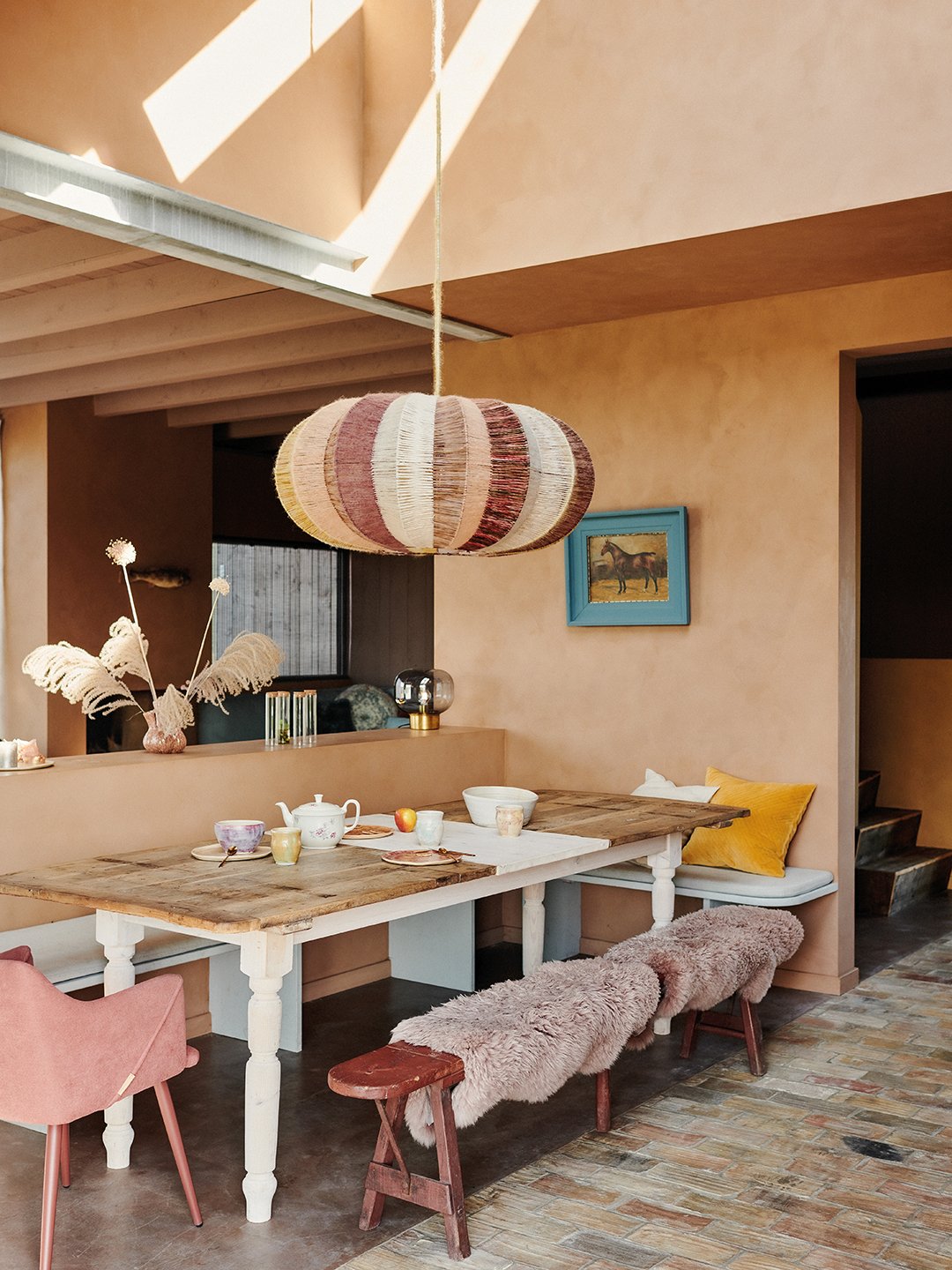 wood dining room with colorful seating