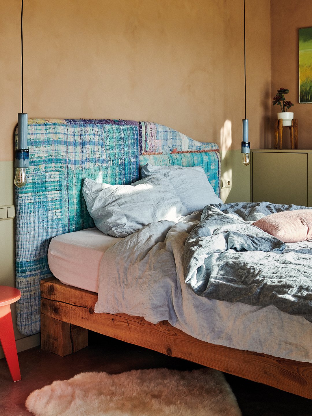 bed with patchwork headboard