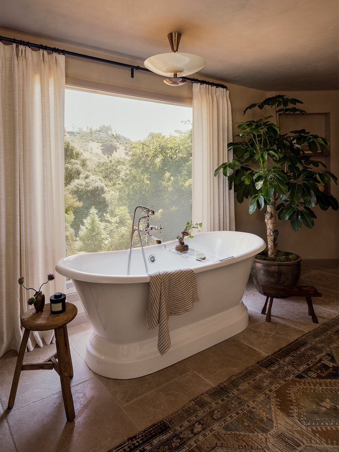 brass lamp over tub