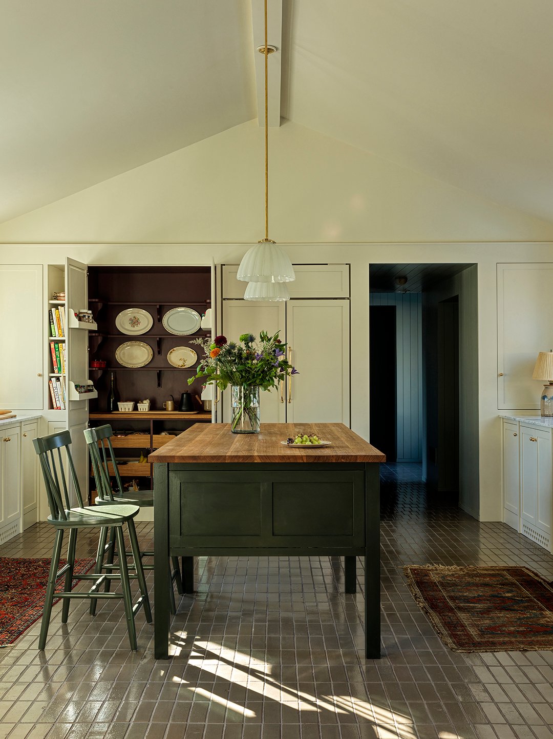 kitchen with green wood island