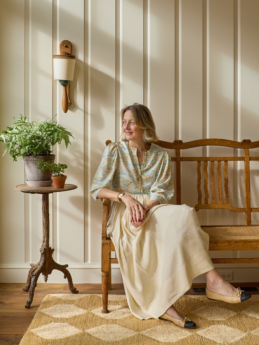 woman leaning on bench
