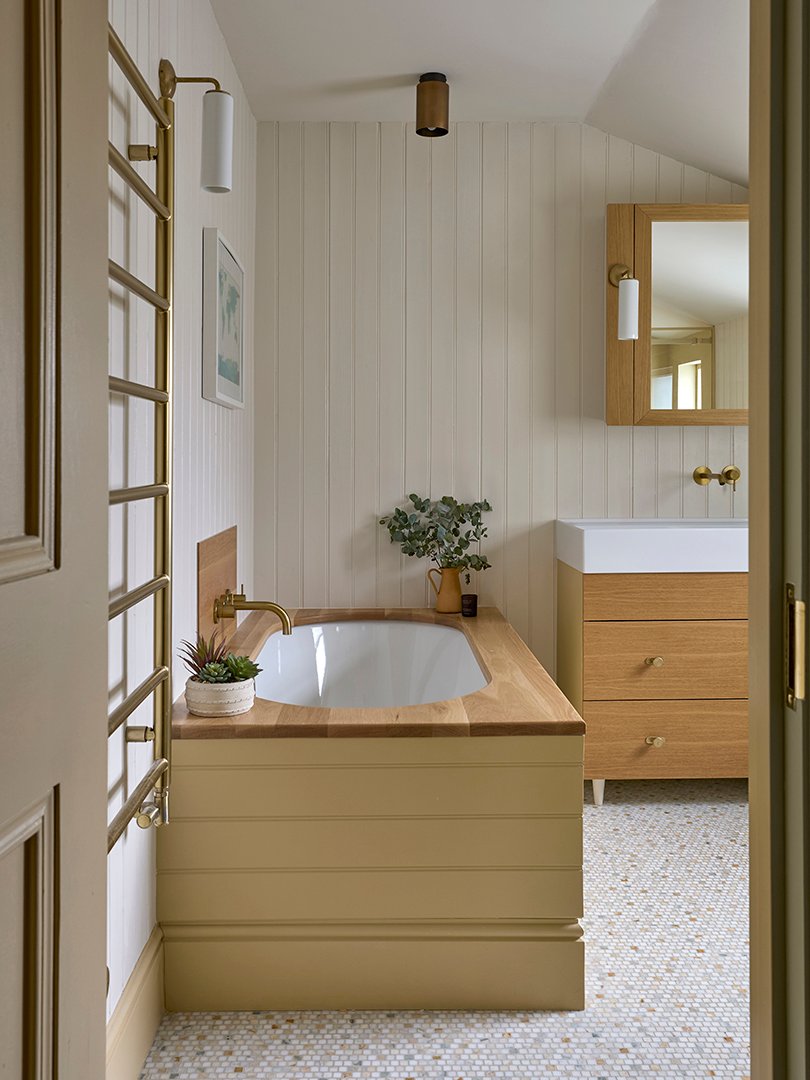 bathroom with yellow tub