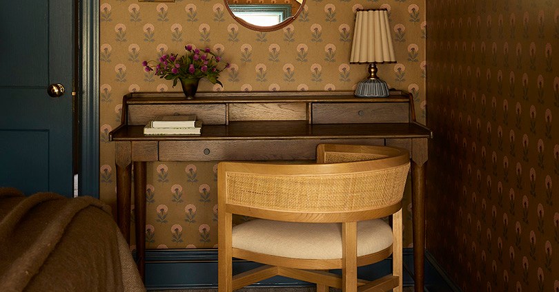 Before & After: A Chintzy Attic Bedroom Morphs Into a Cozy Hotel-Like Suite