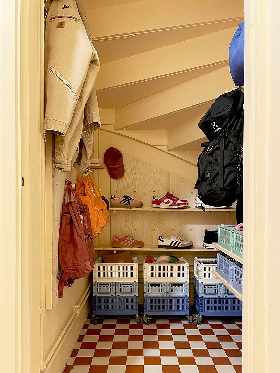 yellow under stairs closet