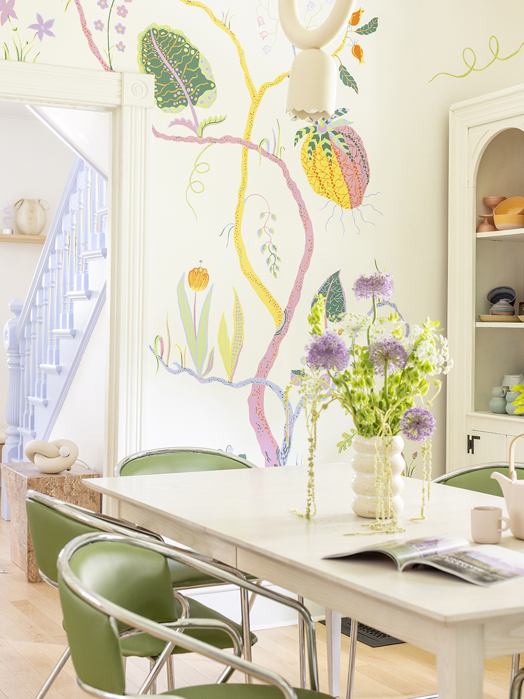dining room with floral mural