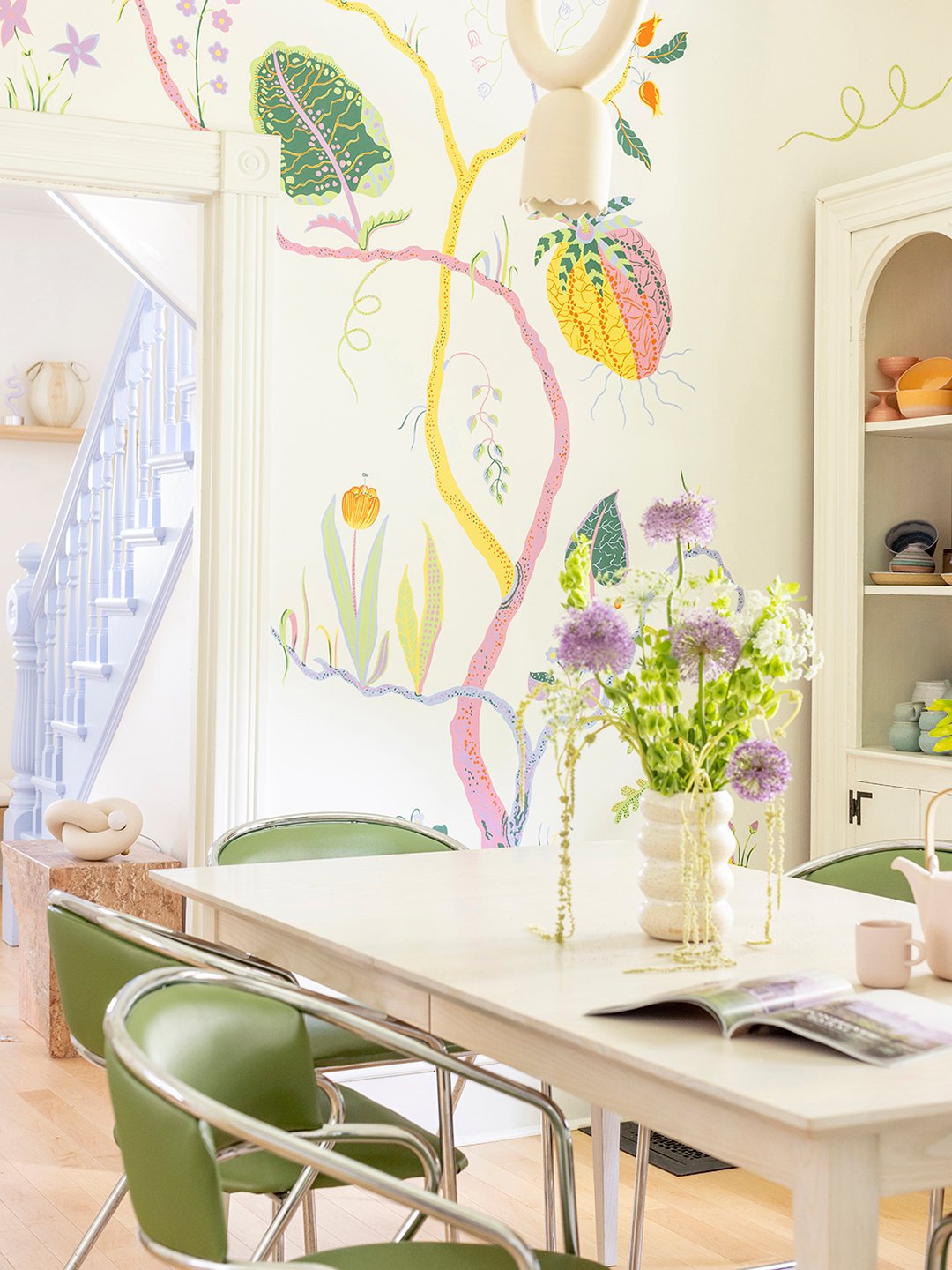 dining room with floral mural