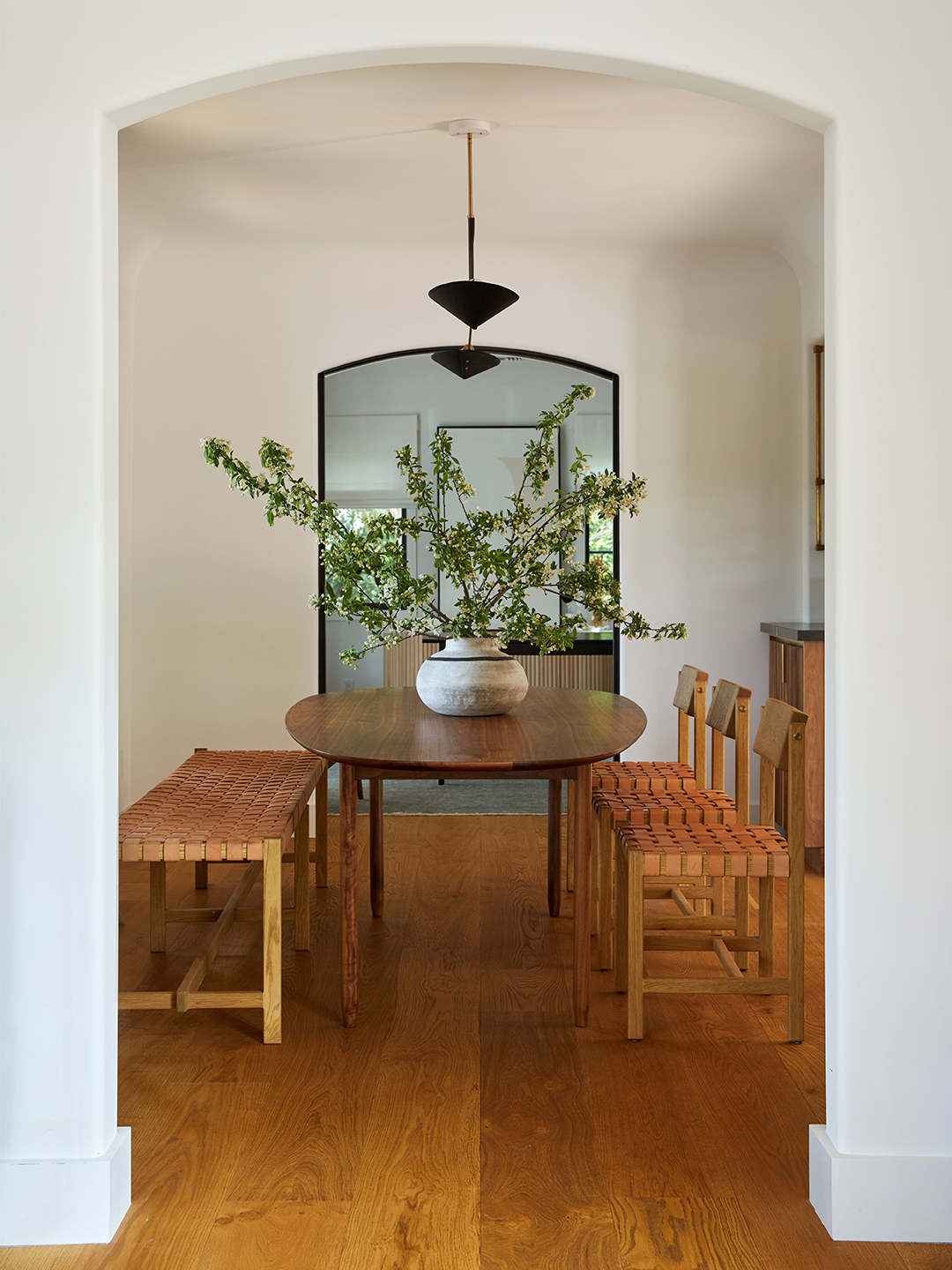 dining room with arched doorways