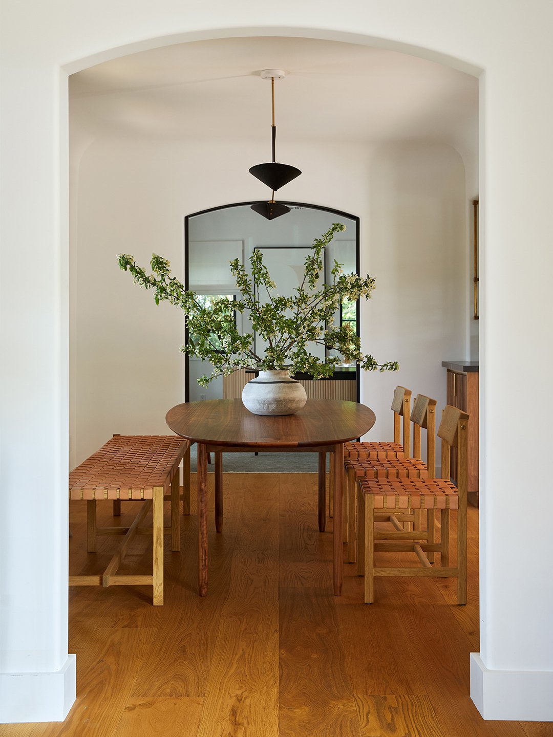dining room with arched doorways