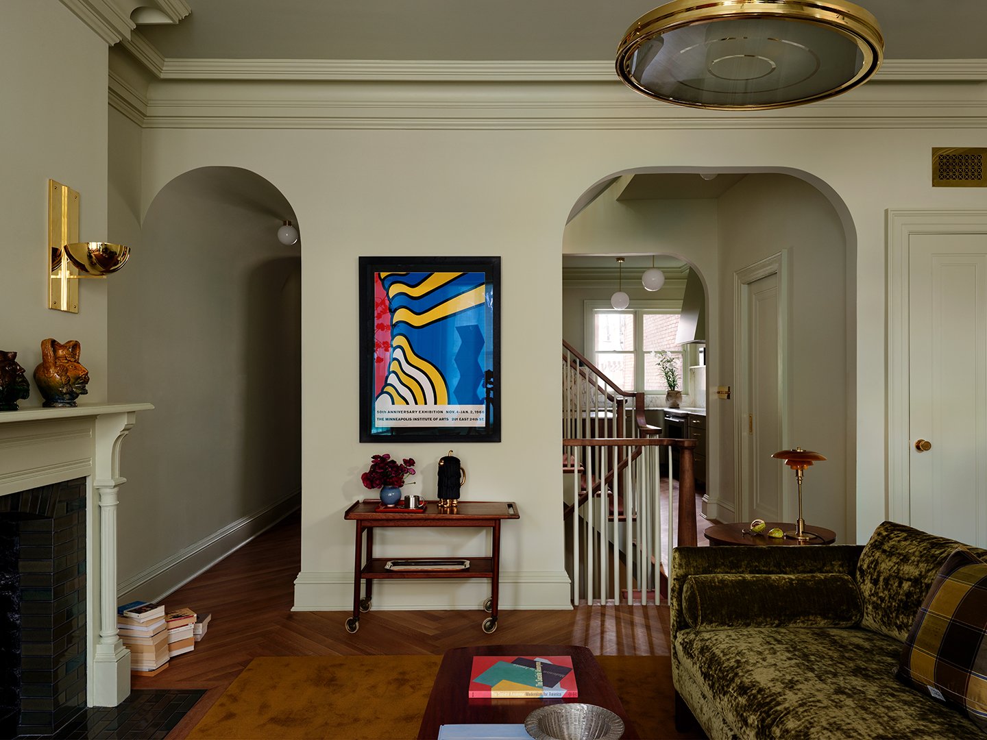 Green living room with arches